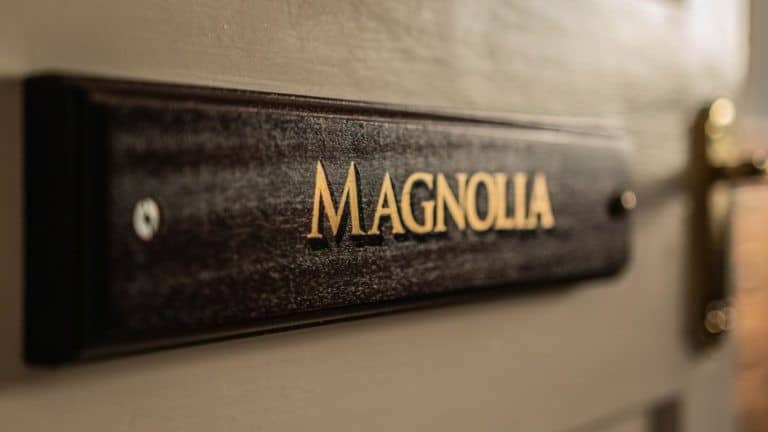 Magnolia-west-wing-apartment-door-sign